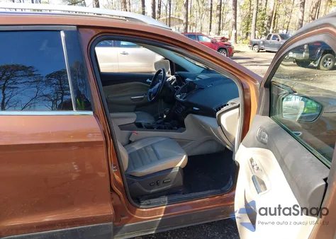 2017 Ford Escape Titanium z USA, uszkodzony, nr VIN 1FMCU9JD1HUA56973